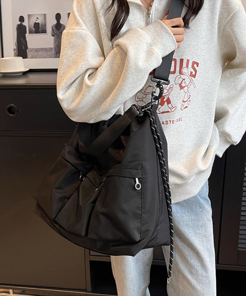 ドローストリングショルダーバッグ 大容量 マルチポケットナイロンバッグ カジュアル巾着バッグ 大きめ肩掛けバッグ 通勤通学 旅行手提げバッグ 多収納かばん男女兼用 1XIUF-078