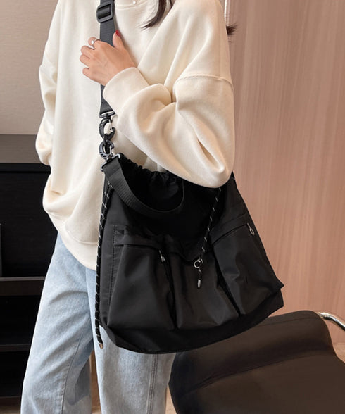 ドローストリングショルダーバッグ 大容量 マルチポケットナイロンバッグ カジュアル巾着バッグ 大きめ肩掛けバッグ 通勤通学 旅行手提げバッグ 多収納かばん男女兼用 1XIUF-078