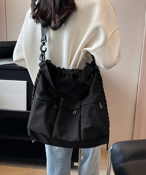 ドローストリングショルダーバッグ 大容量 マルチポケットナイロンバッグ カジュアル巾着バッグ 大きめ肩掛けバッグ 通勤通学 旅行手提げバッグ 多収納かばん男女兼用 1XIUF-078