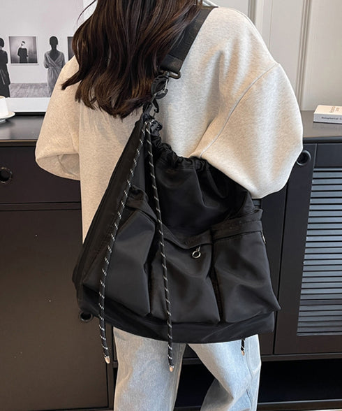 ドローストリングショルダーバッグ 大容量 マルチポケットナイロンバッグ カジュアル巾着バッグ 大きめ肩掛けバッグ 通勤通学 旅行手提げバッグ 多収納かばん男女兼用 1XIUF-078