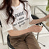 英字ロゴプリント半袖Tシャツスリット入り ラウンドネックTシャツ レディース ゆったり プルオーバー 体型カバー 半袖 大人カジュアル 前後差 夏服 韓国風 通学 21SHANGYI-050