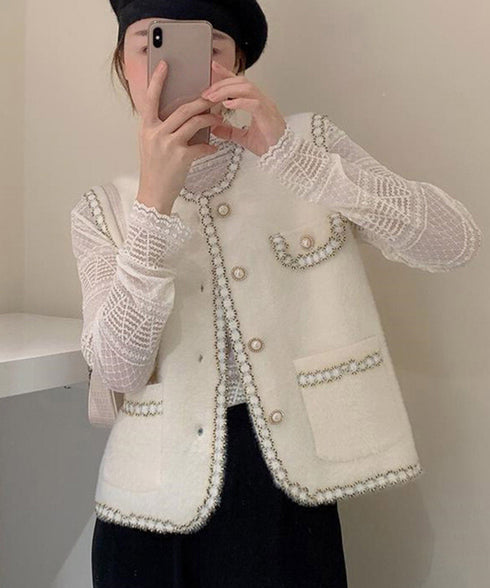 モヘア風ニットベストレディース韓国風秋服 ラメ入りジレベスト ノースリーブジャケット 前開きトップスパールボタン 羽織り お洒落ライトアウター きれいめフェミニン 21SHANGYI-081