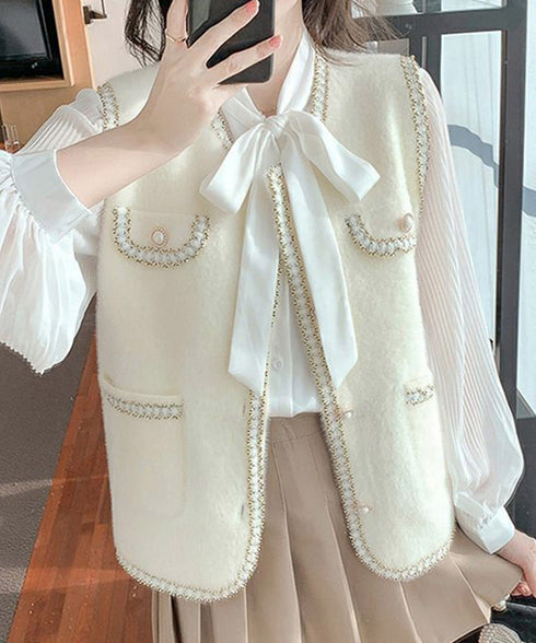 モヘア風ニットベストレディース韓国風秋服 ラメ入りジレベスト ノースリーブジャケット 前開きトップスパールボタン 羽織り お洒落ライトアウター きれいめフェミニン 21SHANGYI-081