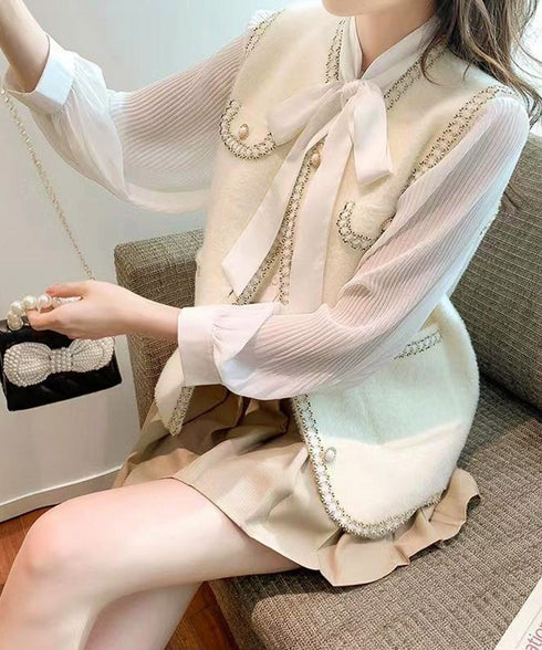 モヘア風ニットベストレディース韓国風秋服 ラメ入りジレベスト ノースリーブジャケット 前開きトップスパールボタン 羽織り お洒落ライトアウター きれいめフェミニン 21SHANGYI-081