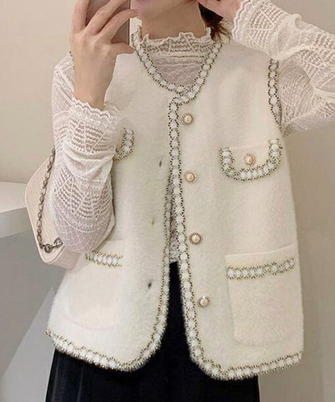 モヘア風ニットベストレディース韓国風秋服 ラメ入りジレベスト ノースリーブジャケット 前開きトップスパールボタン 羽織り お洒落ライトアウター きれいめフェミニン 21SHANGYI-081