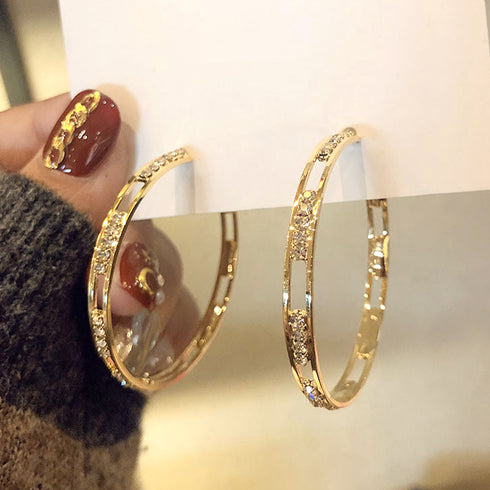 キラキラピアスサークル人気アクセサリー 幾何学模様ピアス レディース おしゃれ ゴールド ジュエリー 韓国風 お呼ばれ 個性的 人気 プレゼント 大人コーデ 春 21SHIPIN-050