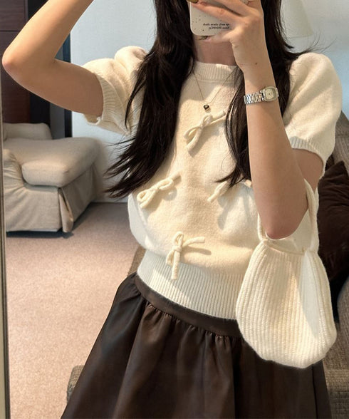 リボン付きニットトップスクルーネック夏服 レディース 大人可愛いニットセーター コンパクト 半袖ニットソー 韓国風 ニットトップ パフスリーブ 着やせ夏トップス 24TPS-088
