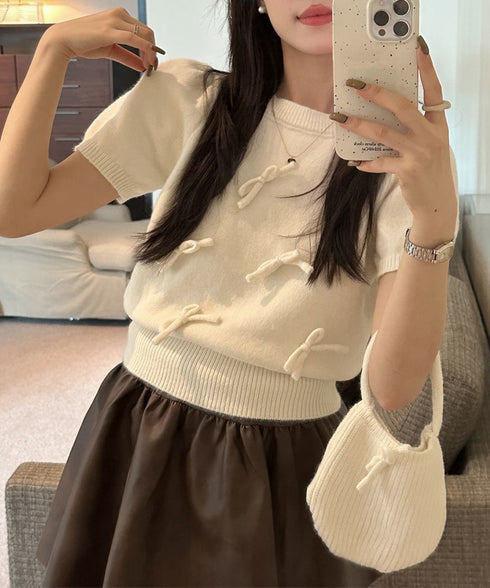 リボン付きニットトップスクルーネック夏服 レディース 大人可愛いニットセーター コンパクト 半袖ニットソー 韓国風 ニットトップ パフスリーブ 着やせ夏トップス 24TPS-088
