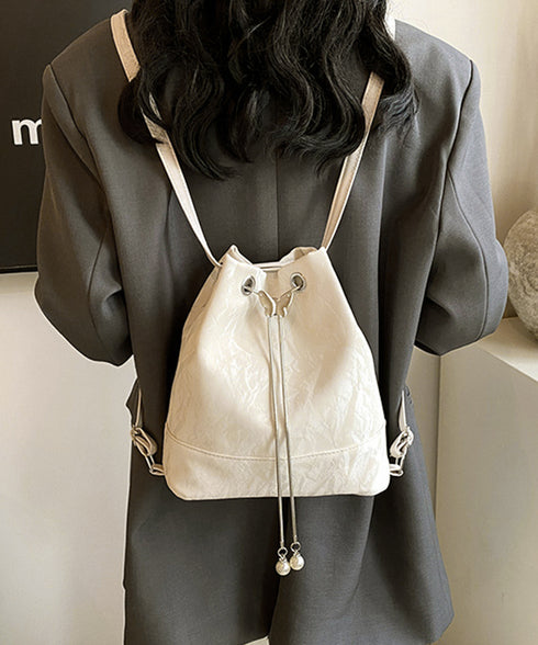 ショルダーバッグ バケツ型鞄 巾着バッグ レディース ミニリュック PUレザー 大人可愛い手提げ パール付きドローストリングバッグ おしゃれ 斜め掛け 3WAY鞄 77AIZHUO-001