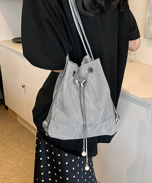 ショルダーバッグ バケツ型鞄 巾着バッグ レディース ミニリュック PUレザー 大人可愛い手提げ パール付きドローストリングバッグ おしゃれ 斜め掛け 3WAY鞄 77AIZHUO-001