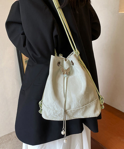 ショルダーバッグ バケツ型鞄 巾着バッグ レディース ミニリュック PUレザー 大人可愛い手提げ パール付きドローストリングバッグ おしゃれ 斜め掛け 3WAY鞄 77AIZHUO-001