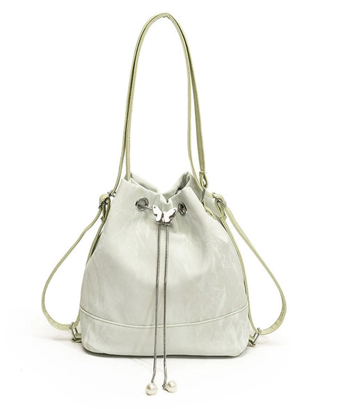 ショルダーバッグ バケツ型鞄 巾着バッグ レディース ミニリュック PUレザー 大人可愛い手提げ パール付きドローストリングバッグ おしゃれ 斜め掛け 3WAY鞄 77AIZHUO-001