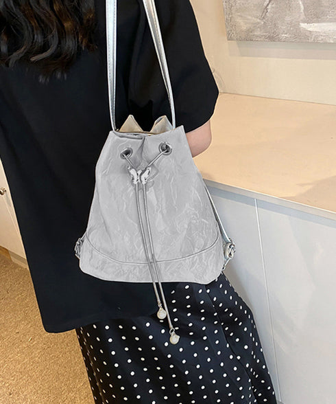 ショルダーバッグ バケツ型鞄 巾着バッグ レディース ミニリュック PUレザー 大人可愛い手提げ パール付きドローストリングバッグ おしゃれ 斜め掛け 3WAY鞄 77AIZHUO-001