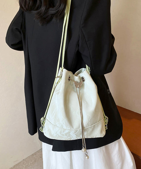 ショルダーバッグ バケツ型鞄 巾着バッグ レディース ミニリュック PUレザー 大人可愛い手提げ パール付きドローストリングバッグ おしゃれ 斜め掛け 3WAY鞄 77AIZHUO-001