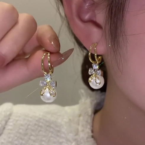 ピアス 韓国 揺れる パールリボンピアス 大粒ピアス レディース 一粒フェイクパール 大ぶりピアス 結婚式 披露宴 アクセサリー プチプラ おしゃれ 耳飾り女性 80MINGHANG-004