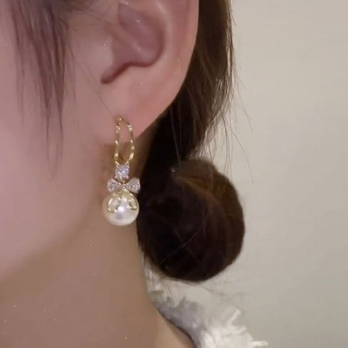 ピアス 韓国 揺れる パールリボンピアス 大粒ピアス レディース 一粒フェイクパール 大ぶりピアス 結婚式 披露宴 アクセサリー プチプラ おしゃれ 耳飾り女性 80MINGHANG-004