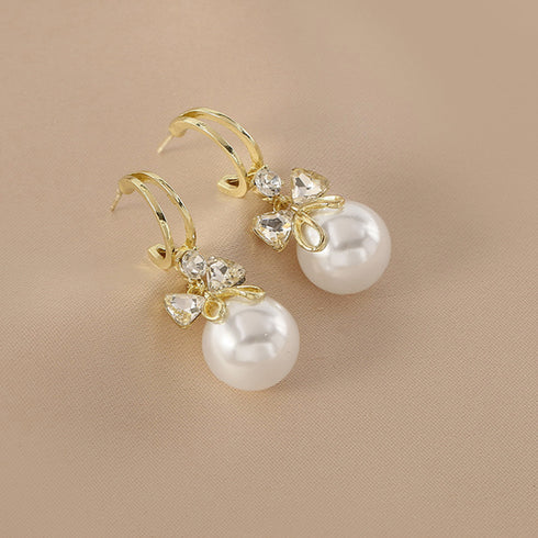 ピアス 韓国 揺れる パールリボンピアス 大粒ピアス レディース 一粒フェイクパール 大ぶりピアス 結婚式 披露宴 アクセサリー プチプラ おしゃれ 耳飾り女性 80MINGHANG-004