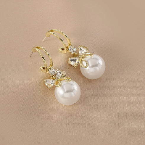 ピアス 韓国 揺れる パールリボンピアス 大粒ピアス レディース 一粒フェイクパール 大ぶりピアス 結婚式 披露宴 アクセサリー プチプラ おしゃれ 耳飾り女性 80MINGHANG-004