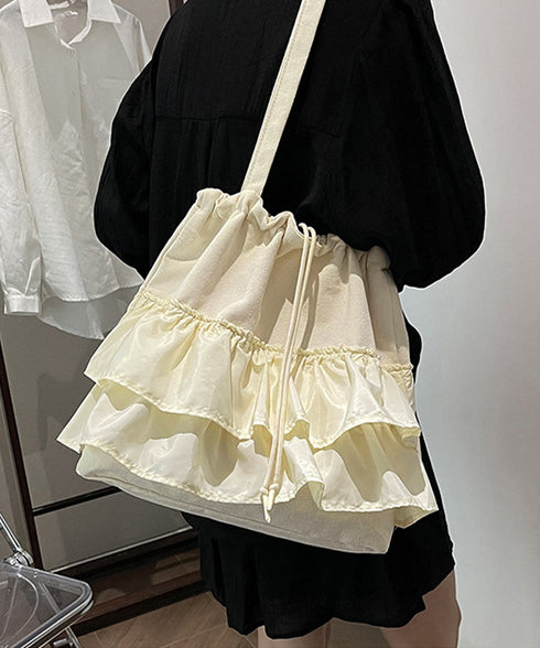 ティアードフリルトートバッグ キャンバス 大きめ 巾着バッグ 異素材切り替え マザーズバッグ 通勤通学肩掛けバッグ カジュアル 大容量bag 韓国風 手提げバッグ 80ZCFX-007
