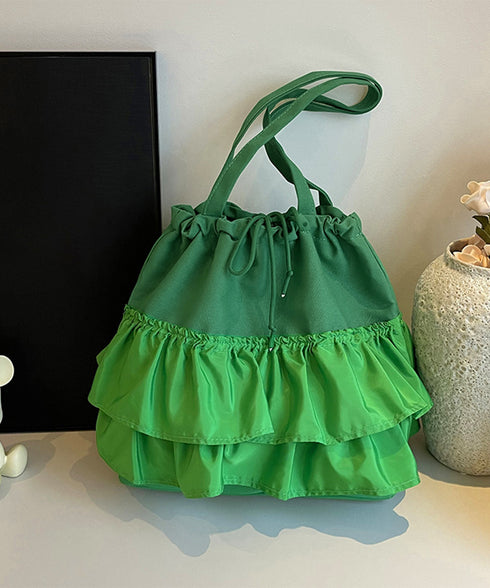 ティアードフリルトートバッグ キャンバス 大きめ 巾着バッグ 異素材切り替え マザーズバッグ 通勤通学肩掛けバッグ カジュアル 大容量bag 韓国風 手提げバッグ 80ZCFX-007