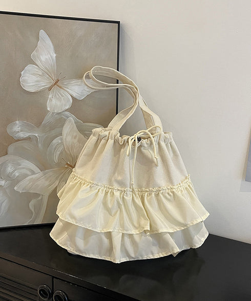 ティアードフリルトートバッグ キャンバス 大きめ 巾着バッグ 異素材切り替え マザーズバッグ 通勤通学肩掛けバッグ カジュアル 大容量bag 韓国風 手提げバッグ 80ZCFX-007