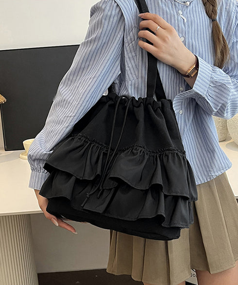 ティアードフリルトートバッグ キャンバス 大きめ 巾着バッグ 異素材切り替え マザーズバッグ 通勤通学肩掛けバッグ カジュアル 大容量bag 韓国風 手提げバッグ 80ZCFX-007