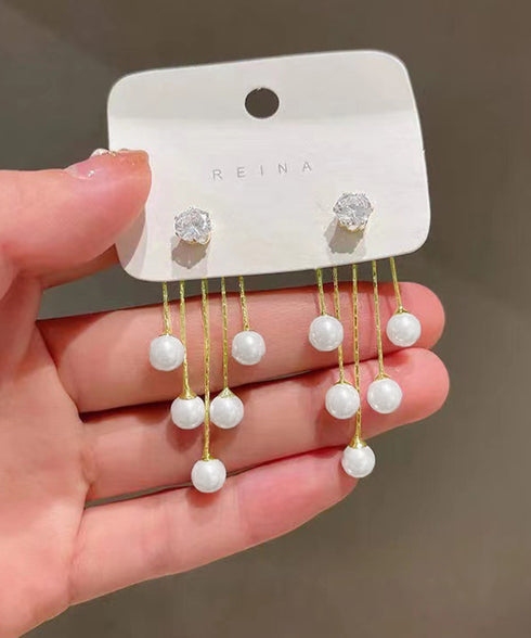 フェイクパールピアスキラキラロングピアス 上品パールチェーンピアス韓国風 フリンジアクセサリー 小顔見えフェミニンジュエリー 揺れるピアス大人可愛いビジュー耳飾り 83JUQI-001