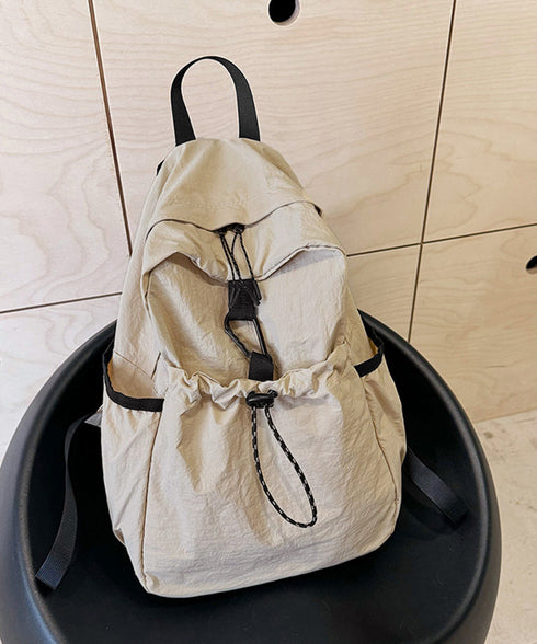 ドロストポケットリュック 軽量デイパック 韓国風リュックサックシンプルおしゃれ 通学バッグパック高校生大学生 ドローストリングリュックナイロン鞄 旅行リュック大人 84MUXI-001