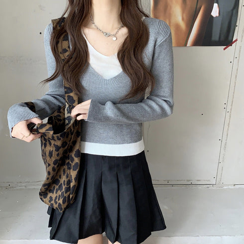 ニットトップスレイヤード風 ニットソー レディース バイカラー 重ね着風 ニットセーター Vネック 無地 お洒落 リブニット カジュアル 85YN-900250