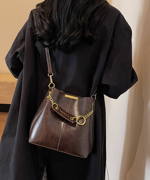 バケットバッグレディースショルダーバッグ バケツバッグ 高見え 斜めがけバッグ 大容量 フェイクレザーバッグ 仕切りポケット付き マチ広バッグ合皮 手提げ鞄お洒落 87XIUFENG-003