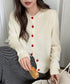 ハートボタンニットカーディガン秋冬韓国風 おしゃれニットトップス レディース きれいめカジュアル 長袖 大人可愛いセーターシンプル 洗えるニット クルーネック秋服 87HUANYI-002