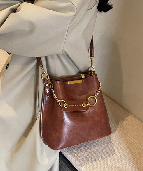 バケットバッグレディースショルダーバッグ バケツバッグ 高見え 斜めがけバッグ 大容量 フェイクレザーバッグ 仕切りポケット付き マチ広バッグ合皮 手提げ鞄お洒落 87XIUFENG-003