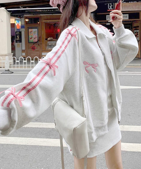 リボン付きスウェットジップアップパーカー レディース おしゃれ ガーリーリボンジャケット 袖ラインスウェットジャケット 春秋薄手 ワンポイントスポーティカジュアル 87XIXI-001