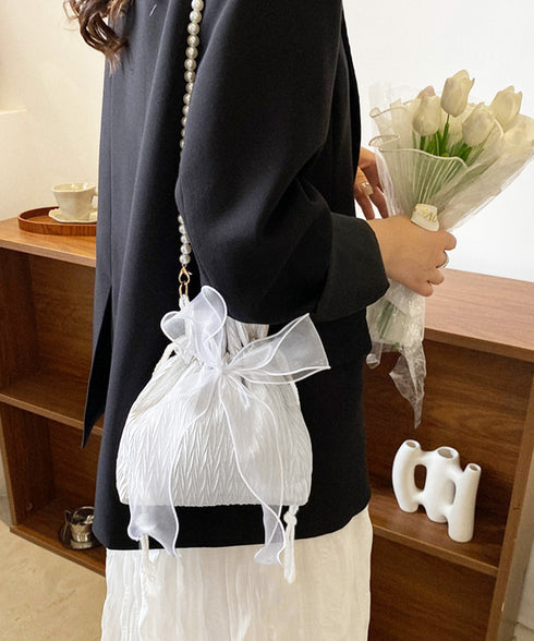 巾着ショルダーバッグ リボン付き 結婚式 レディース レースリボンミニ巾着かばん 大人可愛いクラッチバッグ パールショルダー 軽量バッグ きれいめ コンパクト鞄 89XFENG-065