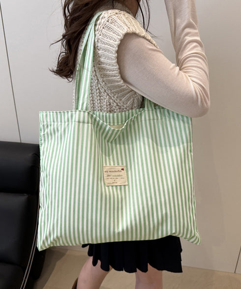 配色ストライプトートバッグ大容量韓国風鞄 レディース ワッペンタグ軽量サブバッグ A4収納 通勤通学トート おしゃれ ロゴタグ肩掛けバッグ 折りたたみ鞄旅行バッグ 96KZHUO-001