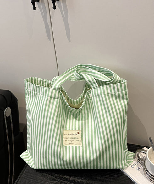 配色ストライプトートバッグ大容量韓国風鞄 レディース ワッペンタグ軽量サブバッグ A4収納 通勤通学トート おしゃれ ロゴタグ肩掛けバッグ 折りたたみ鞄旅行バッグ 96KZHUO-001