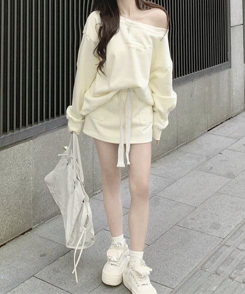 英字ロゴスウェットセットアップ大人可愛い レディーストレーナーきれいめ ポケット付き インナーパンツ付きスカートウエストゴム ドロップショルダートップスおしゃれ服 97TAOZH-003