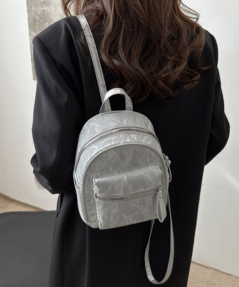 ミニリュックサック コンパクトバッグ 黒 レディース マーブル柄 ラウンド型リュック フェイクレザー 軽量 シンプル カジュアル きれいめ おしゃれ 旅行かばん 99MSXB-004