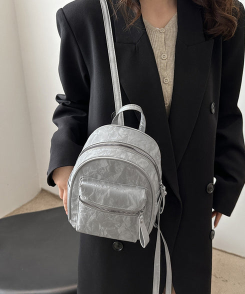 ミニリュックサック コンパクトバッグ 黒 レディース マーブル柄 ラウンド型リュック フェイクレザー 軽量 シンプル カジュアル きれいめ おしゃれ 旅行かばん 99MSXB-004