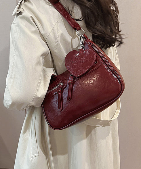 レトロショルダーバッグ ハートチャーム付 レディース 斜め掛け鞄 PUレザー肩掛けカバン 大人可愛いミニ鞄 韓国風 カジュアル ハンドバッグ 多収納 ストリート鞄 TZM-328