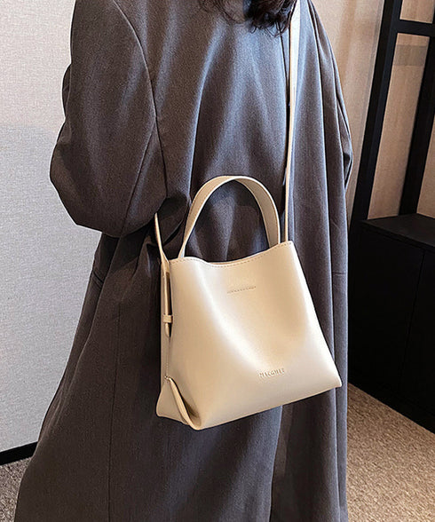 ショルダーバッグ 2wayバケットバッグ レディース 大人可愛い ミニハンドバッグ PUレザー オフィスカジュアル スクエア 斜め掛けバッグ バケツ型 合皮かばん TZM-318