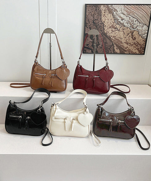 レトロショルダーバッグ ハートチャーム付 レディース 斜め掛け鞄 PUレザー肩掛けカバン 大人可愛いミニ鞄 韓国風 カジュアル ハンドバッグ 多収納 ストリート鞄 TZM-328