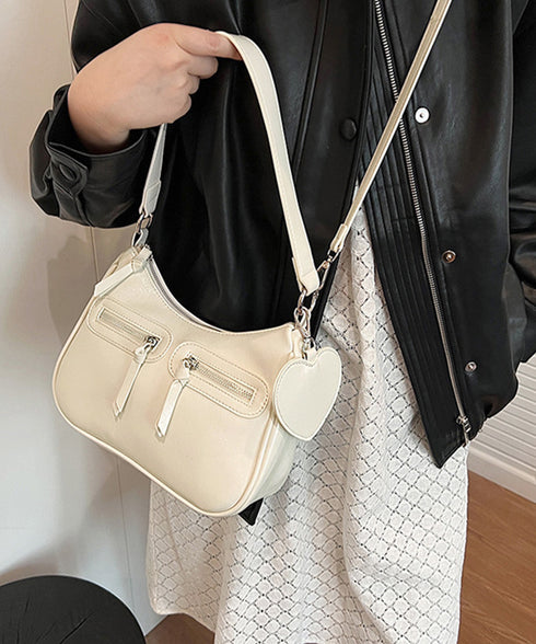 レトロショルダーバッグ ハートチャーム付 レディース 斜め掛け鞄 PUレザー肩掛けカバン 大人可愛いミニ鞄 韓国風 カジュアル ハンドバッグ 多収納 ストリート鞄 TZM-328