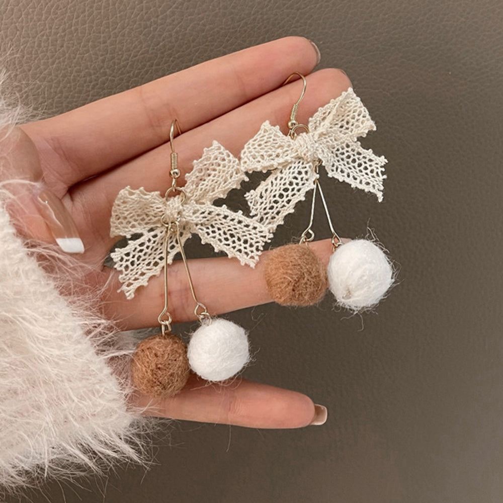 リボンピアス レディース ポンポンピアス アイボリー