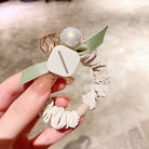 シュシュリボンヘアゴム ヘアアクセサリー アイボリー