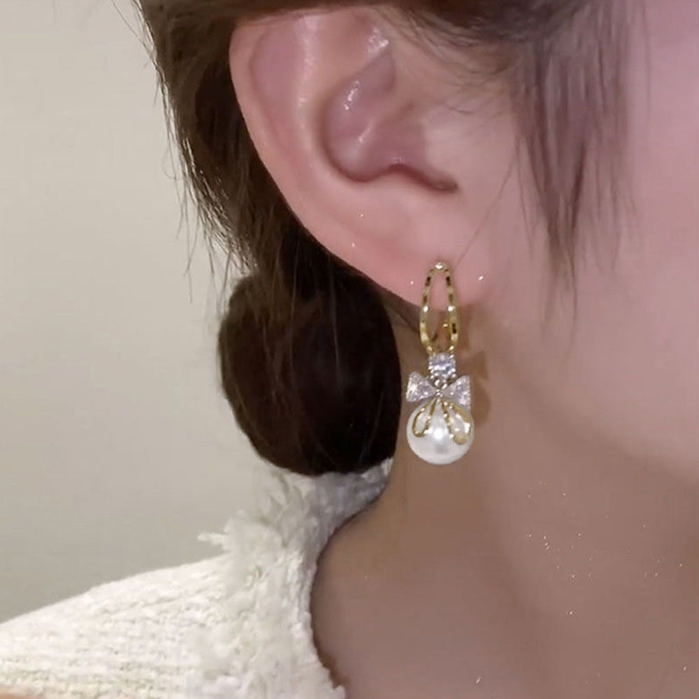 ピアス 韓国 揺れる パールリボンピアス ゴールド