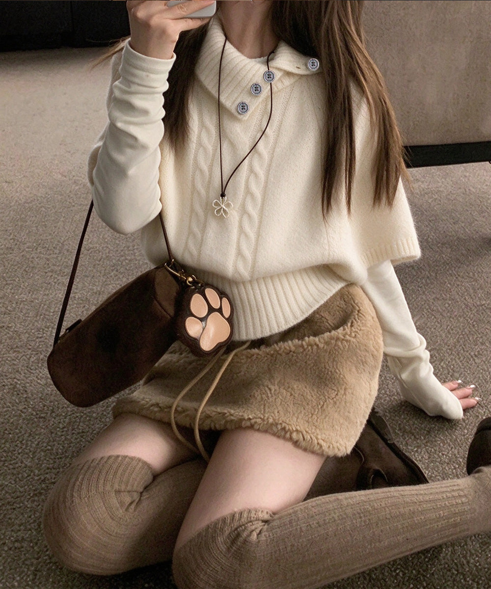 ケーブル編みニットポンチョケープトップス