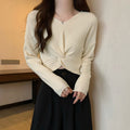 フロントツイスト ニットプルオーバー秋服 アイボリー
