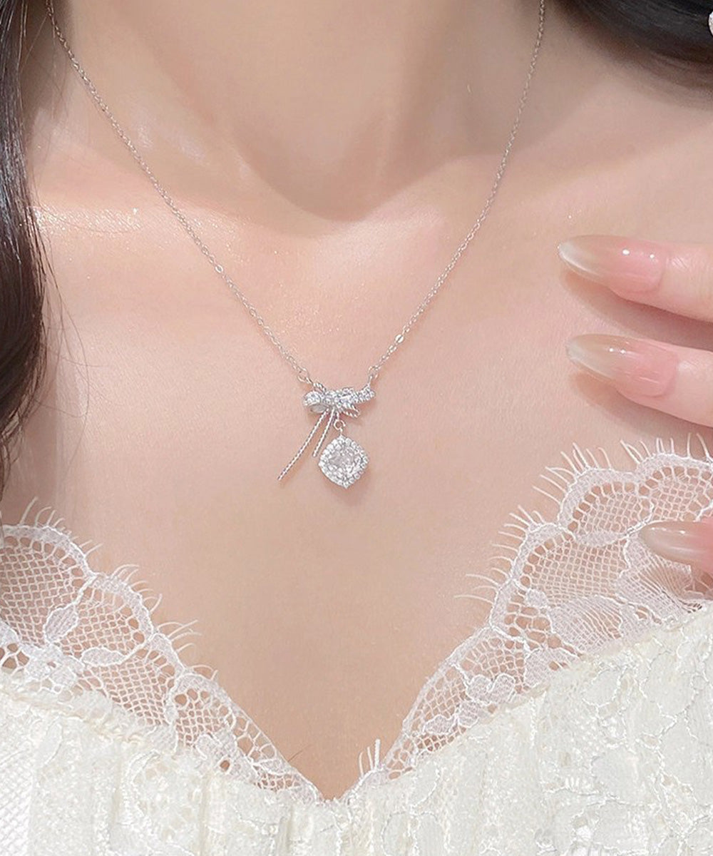 リボンネックレス レディース結婚式韓国風 プチプラアクセサリー ジュエリー 大人可愛い首飾り 細チェーンネックレス きらきら輝くラインストーン パーティー ギフト 89MIGE-004